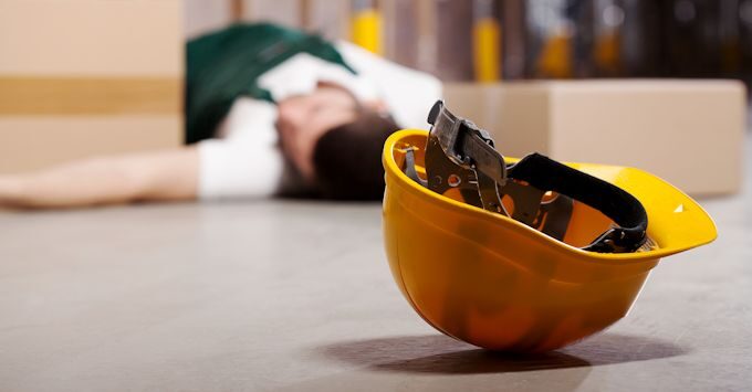 Worker laying on the floor